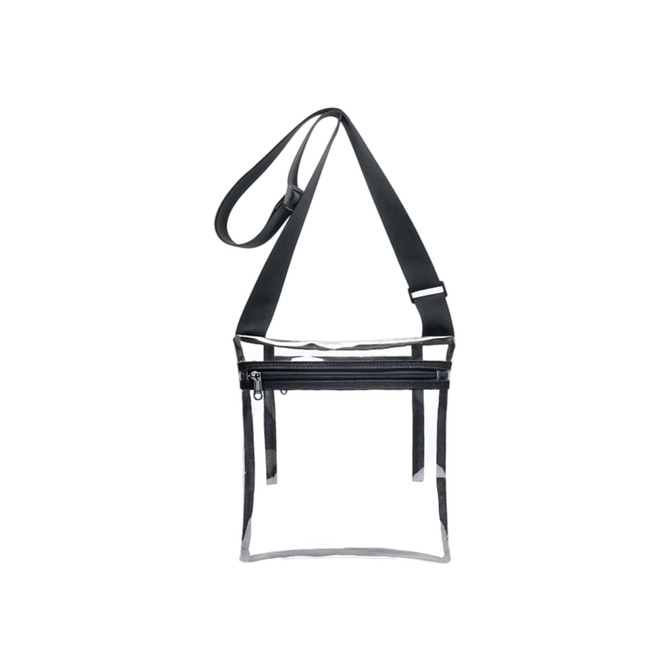 A clear PVC crossbody bag with a black strap and an inner pouch, featuring a zippered compartment.