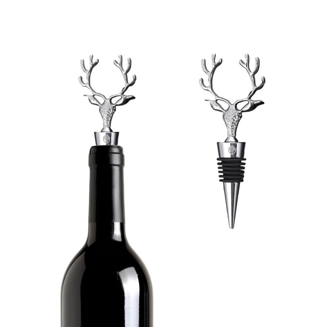 A drink bottle topped with a silver deer head wine stopper, featuring antlers and a rubber base for sealing.