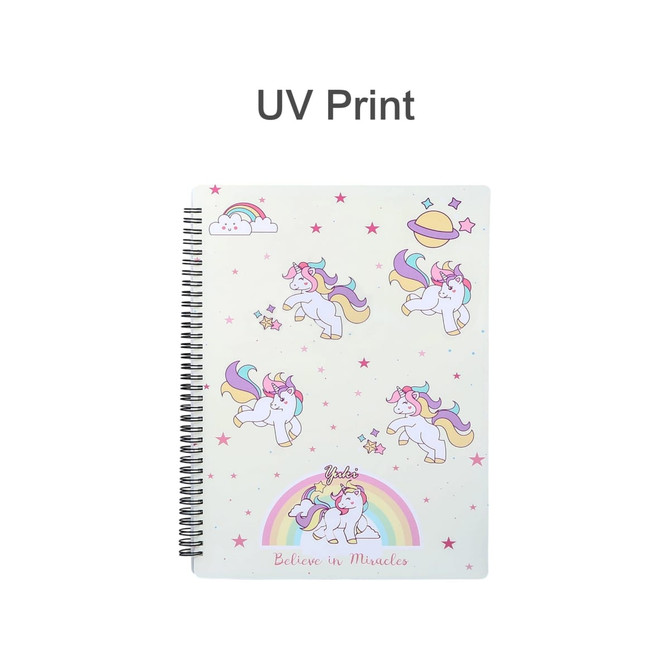 A spiral-bound folder featuring colourful unicorn illustrations on a light background, with stars and clouds. It has a logo.