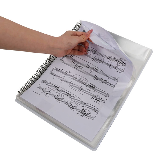 A loose-leaf folder with a transparent cover, showcasing sheet music inside and a hand turning the pages.