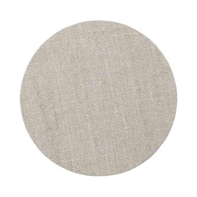A round, textured mat in a light beige colour, featuring a natural, woven design.