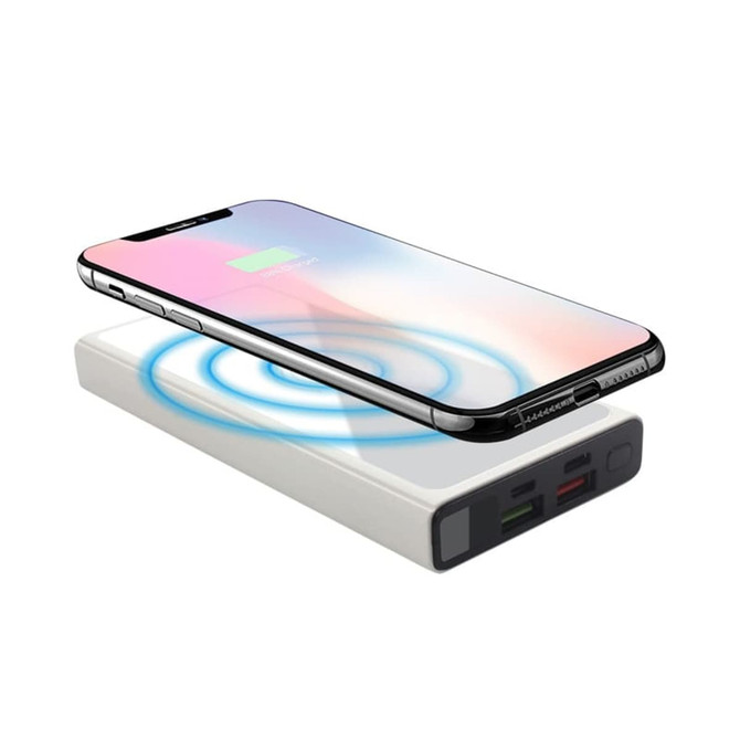 A white wireless power bank with a smartphone above it, indicating wireless charging functionality.