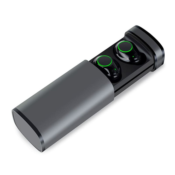A pair of black earbuds with green accents, housed in a grey charging case.