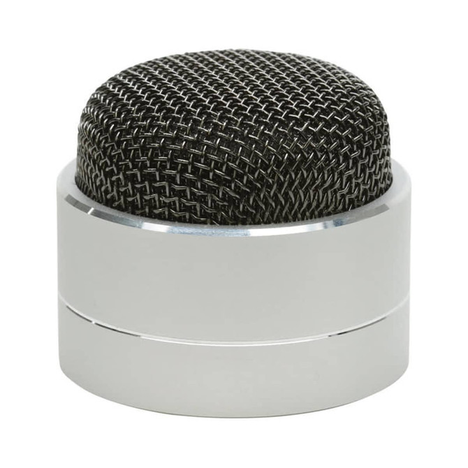 A compact silver Bluetooth speaker with a black mesh top design. It features a sleek, rounded shape and a branding logo.