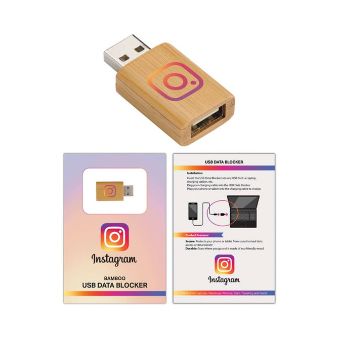 A bamboo USB data blocker with a USB plug, featuring a logo. Accompanied by instructional cards.