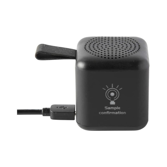 A black mini cube Bluetooth speaker with a USB connection and a small branding logo.