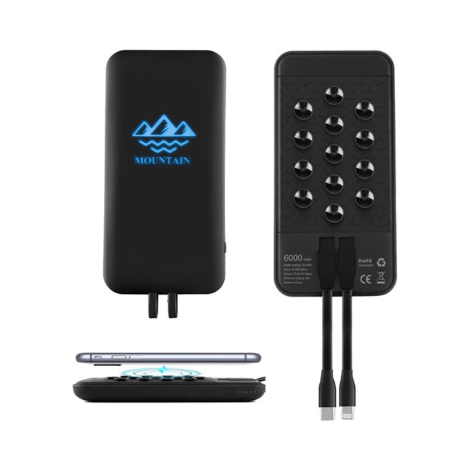 A black wireless power bank with a blue logo and multiple charging ports. It has a 6000 mAh capacity.