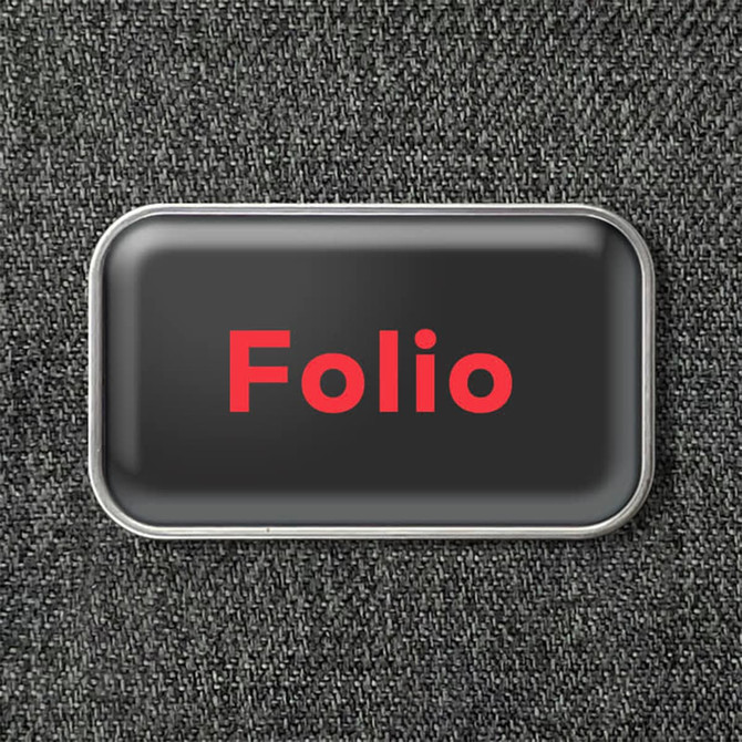 A black toiletry bag with a silver trim and a logo featuring the word "Folio" in red.