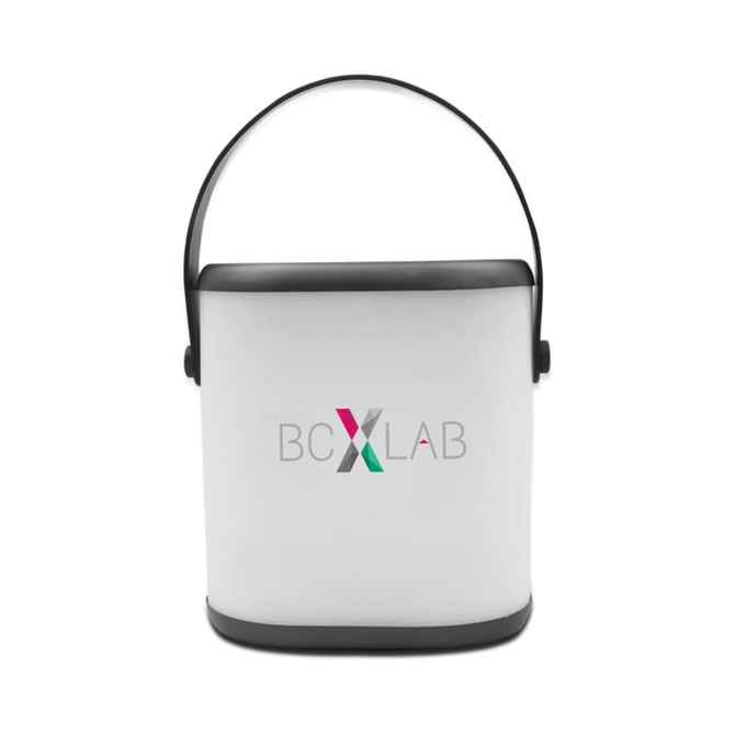 A portable white LED speaker with a black handle and branding on the front.