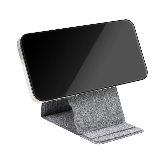 A wireless charger in grey fabric, designed to hold a smartphone upright for convenient charging. A wireless charger in grey fabric, designed to hold a smartphone upright for convenient charging.
