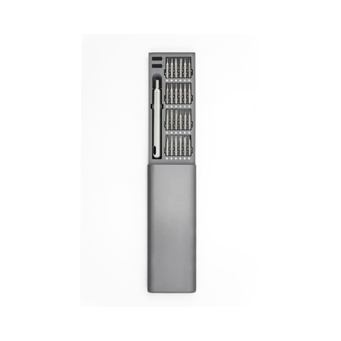 A grey precision tool kit featuring various screw bits and a handle, contained in a sleek case with a logo.