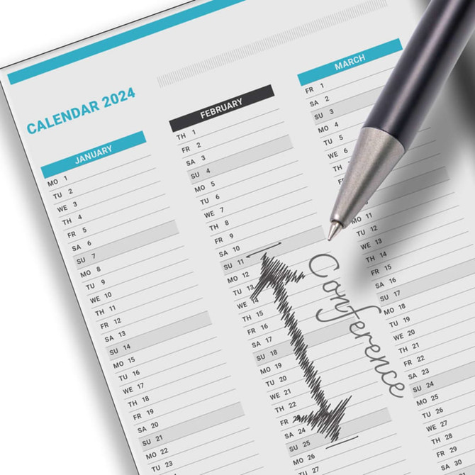 A pen in silver colour poised over a 2024 calendar page with handwritten notes for February and March.