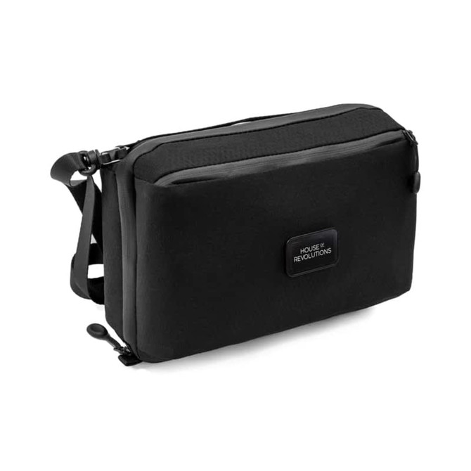 A black toiletry bag featuring a logo, with multiple compartments and a carry strap.