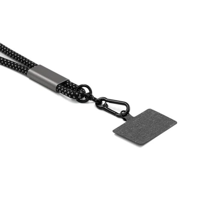 A black eco-friendly phone strap with a clip and textured tag, designed for charging and data connectivity. A black eco-friendly phone strap with a clip and textured tag, designed for charging and data connectivity.
