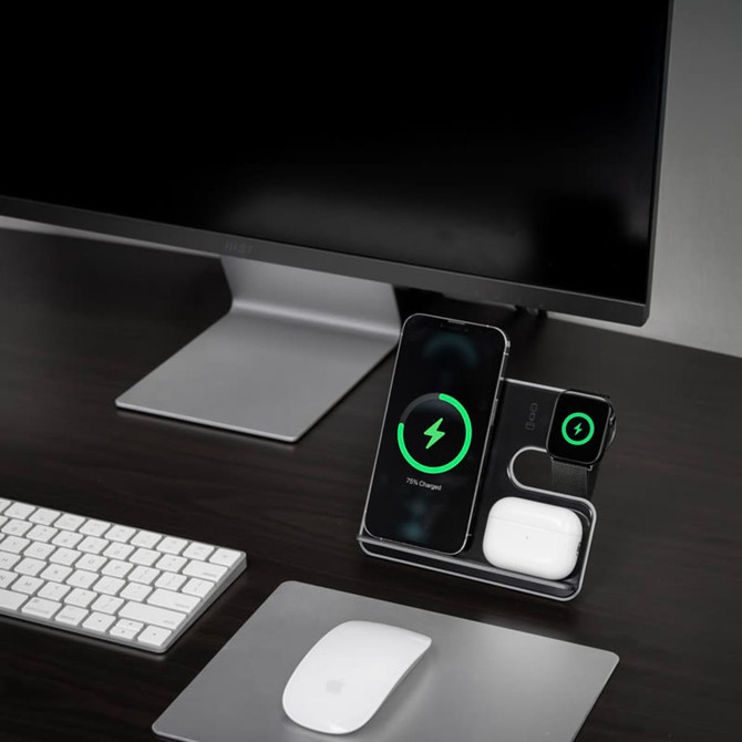 A wireless charging stand in black with compartments for a phone, AirPods, and a smartwatch, placed on a desk. A wireless charging stand in black with compartments for a phone, AirPods, and a smartwatch, placed on a desk.