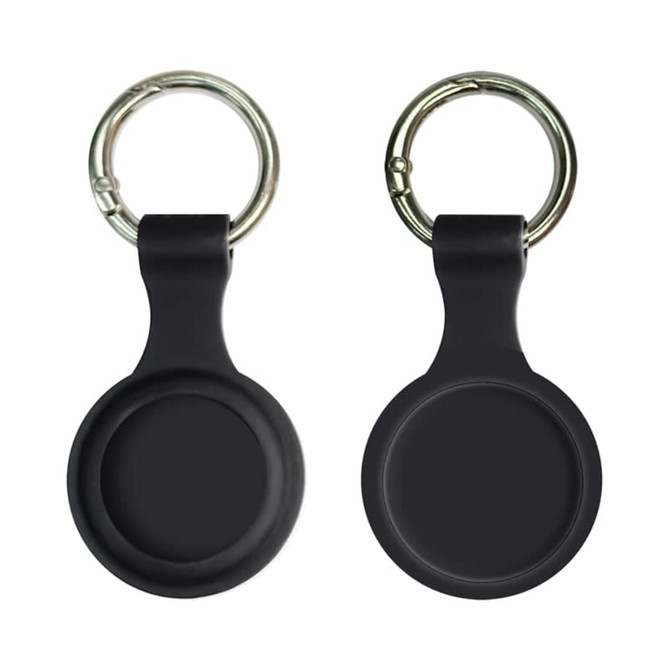 A silicone Airtag case in black with a keyring attached, featuring a smooth, round design.