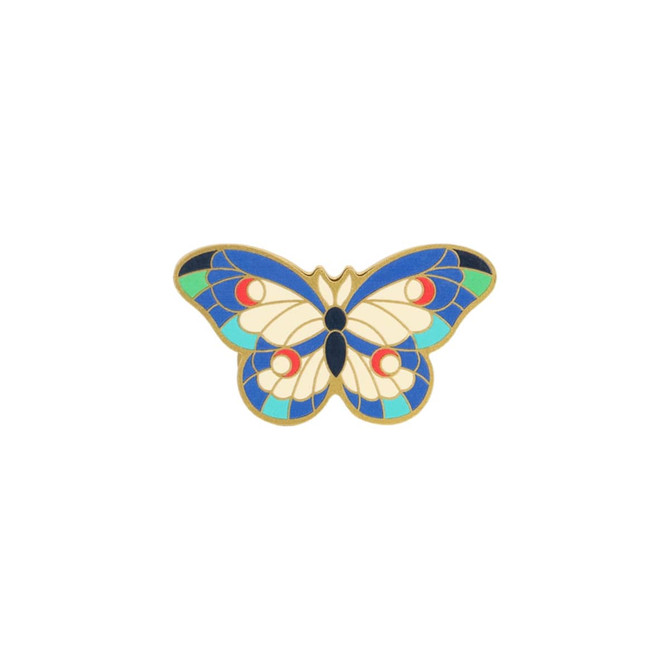 A colourful butterfly design featuring blue, green, and red patterns, outlined in gold. The image includes a logo.