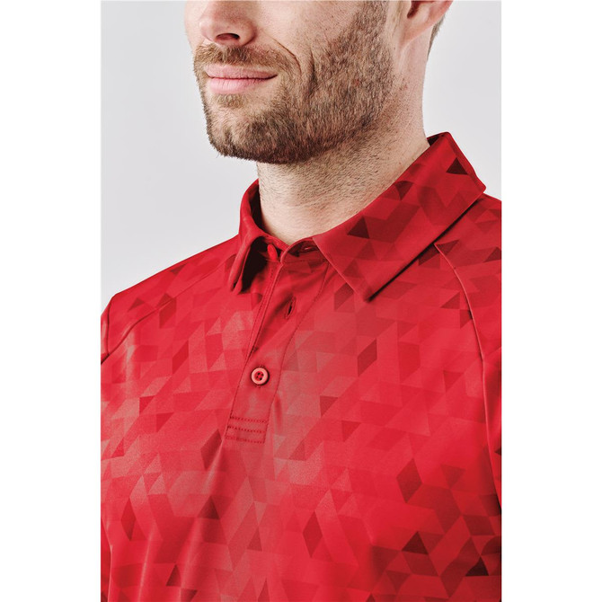A red polo shirt featuring a geometric pattern and a collar, designed for men. Includes a branding logo.