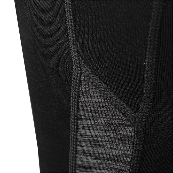 A close-up of black women's leggings featuring textured grey panels and seam detailing. Includes a logo.