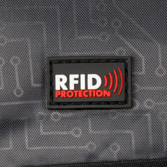 A black patch featuring the words "RFID Protection" in red and white, set against a textured grey background.