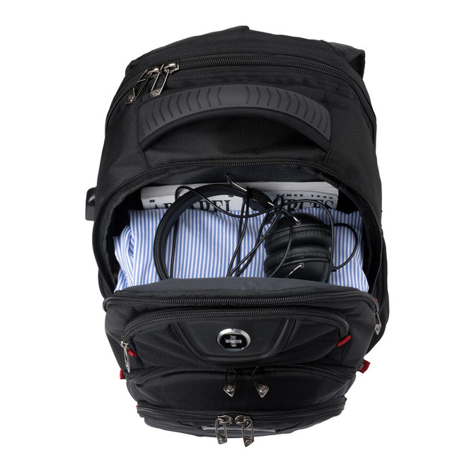 A black backpack with a zippered compartment containing a shirt, headphones, and cables. It features a logo.