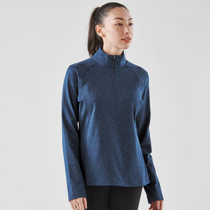 A women's 1/4 zip pullover in navy blue with a fitted design and long sleeves. It features a logo on the chest.
