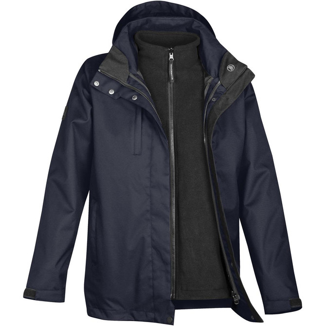 A navy women's parka featuring a removable black fleece liner and a hood, designed as a 3-in-1 rain jacket.