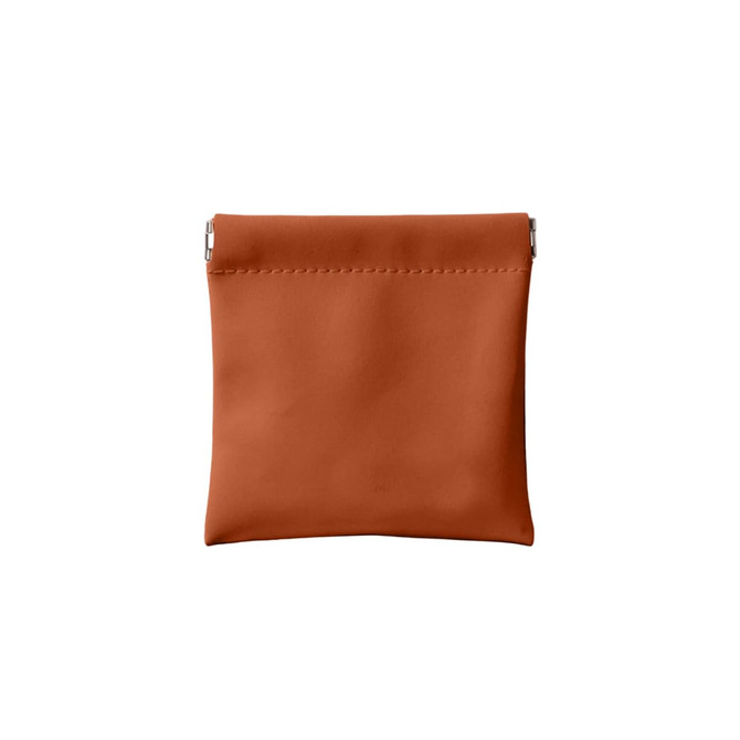 An orange small pocket cosmetic bag with a smooth finish and a metal clasp closure.