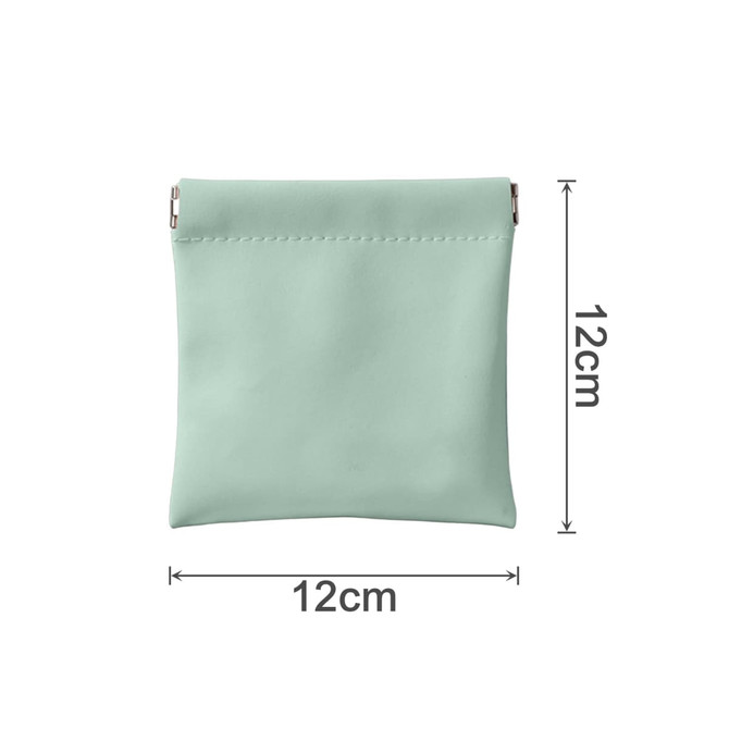 A small, mint green cosmetic bag with a zip closure, measuring 12 cm by 12 cm. It features a branding logo.