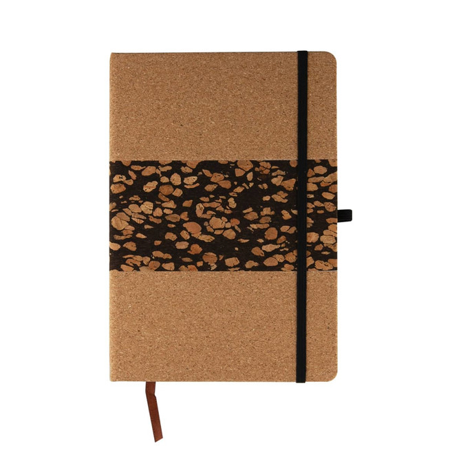 A notebook with a cork cover and a decorative band featuring coffee grounds patterns, secured with a black elastic.