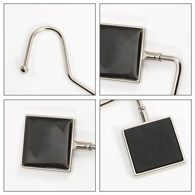A square curved desk hook in silver and black, featuring a sleek design with a glossy finish and a branding logo.