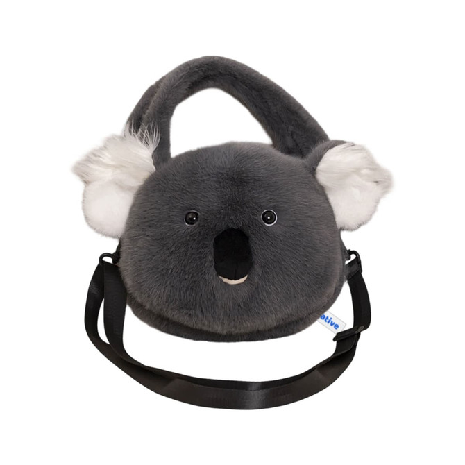 A grey plush handbag shaped like a koala, featuring ears and a smiling face, with a black shoulder strap.