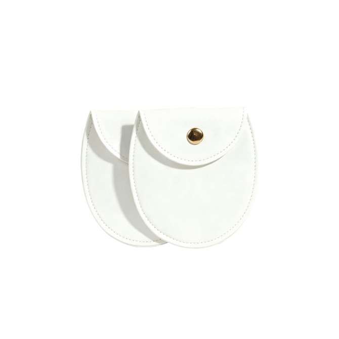 Two oval white PU leather jewelry pouches with a gold snap fastener, featuring a clean and simple design.