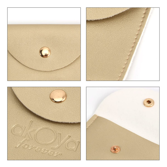 A gold PU leather jewelry pouch with a snap closure and embossed branding. Features a smooth texture and minimalist design.