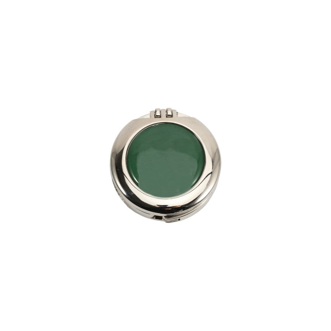 A foldable desk hook with a shiny silver finish and a green mirrored surface. It features a compact, circular design.
