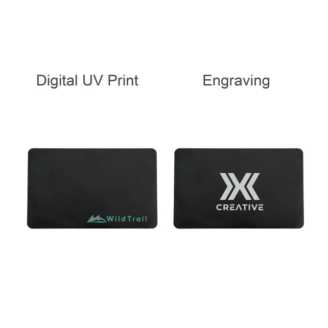 A black metal business card featuring a logo, with options for digital UV print and engraving on either side.