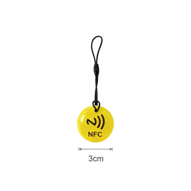 A yellow NFC epoxy round tag with a black logo and attached strap, measuring 3 cm in diameter.