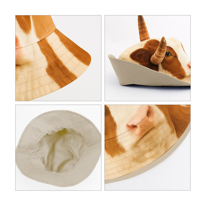 A bucket hat featuring a cow design with brown and white patterns, complete with animal ears and a neutral interior.