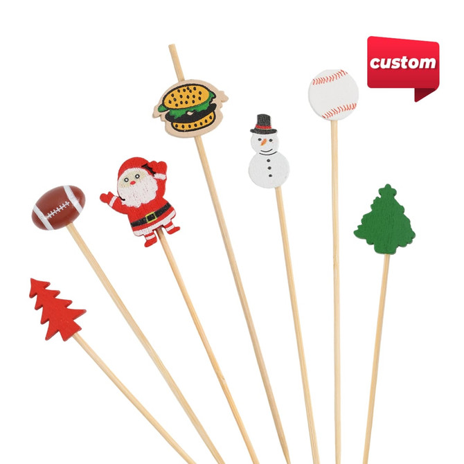 A pack of 100 bamboo skewers featuring various colourful decorative toppers, including seasonal and festive designs.