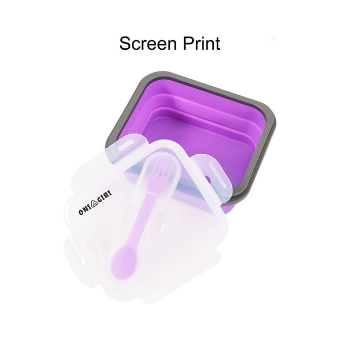 A purple reusable silicone food storage container with a clear lid and included spoon. Brand logo visibly printed.