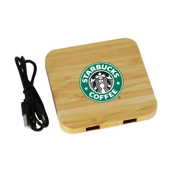 A bamboo wireless charging dock in a square shape, featuring a logo and a connected black charging cable.