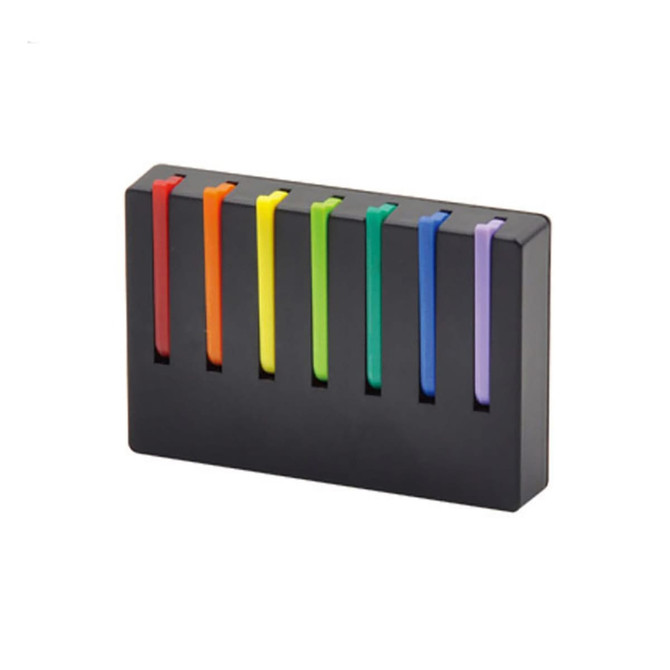 A set of seven colourful rubber bands in red, orange, yellow, green, blue, indigo, and violet, stored in a black holder.