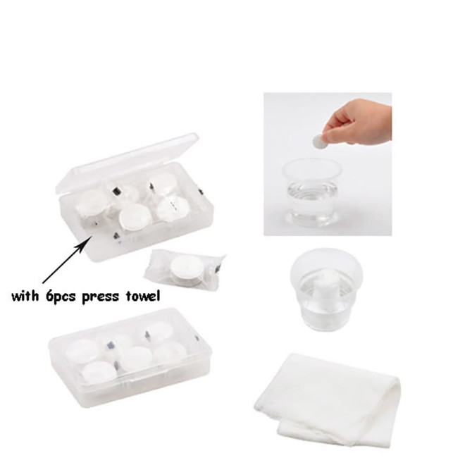 A clear case containing six white press towels, alongside a hand demonstrating their use in water.
