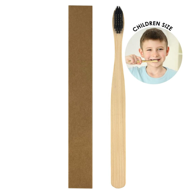 A bamboo toothbrush for kids with a natural finish and black bristles, packaged in a simple cardboard box.