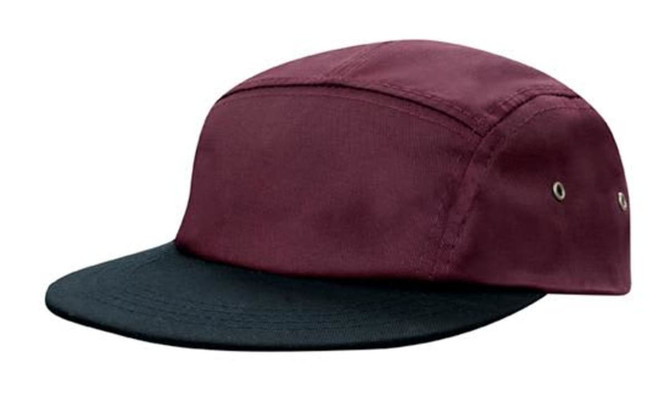 A cotton twill cap in burgundy and black with a flat peak and metal eyelets for ventilation.