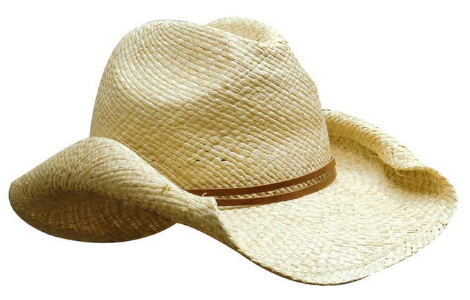 A ladies cowboy straw hat in a light beige colour with a brown band around the base. It has a wide brim design.