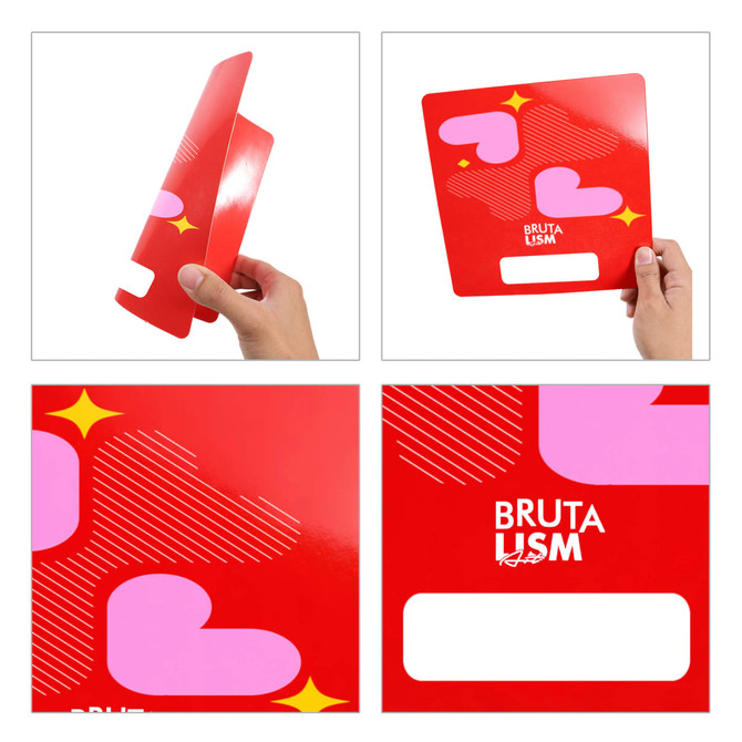 A custom-shaped paper fan in red featuring pink heart designs and a logo. The fan has no handles.