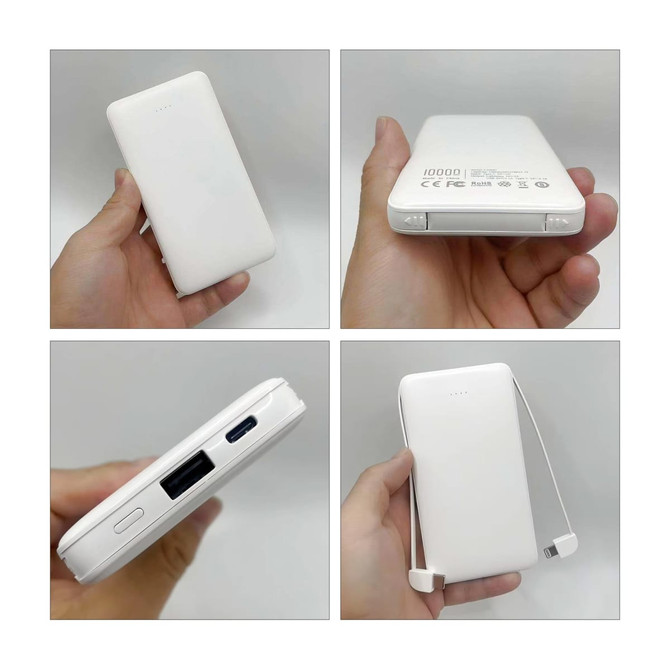 A white 10,000mAh slim power bank held in hand, featuring a built-in charging cable and various ports.