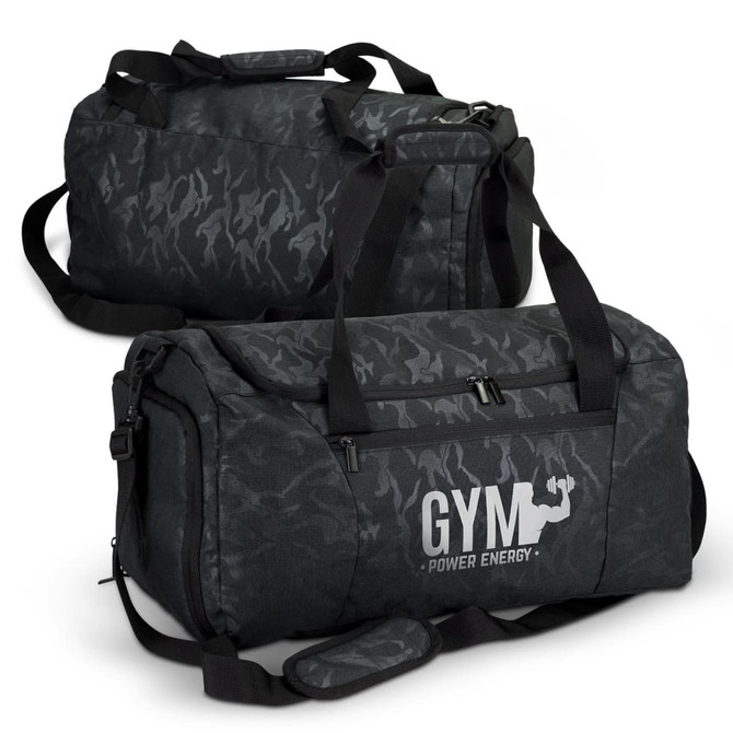 A black urban camouflage duffle bag with dual handles and a shoulder strap, featuring a logo.