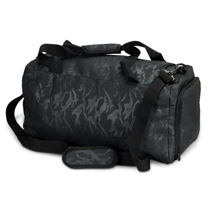 A duffle bag in urban camo pattern featuring black and dark green tones, with a shoulder strap and handles.